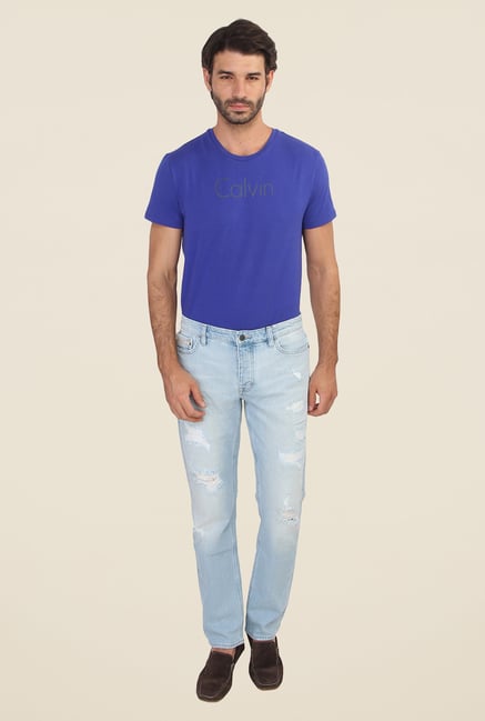 Calvin Klein Blue Lightly Washed Distressed Jeans Calvin Klein Blue Lightly Washed Distressed Jeans