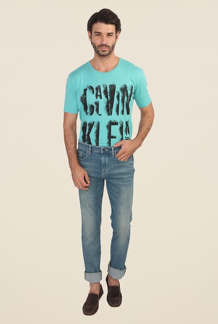 Calvin Klein Blue Slim Fit Mid Rise Solid Jeans Calvin Klein Blue Slim Fit Mid Rise Solid Jeans