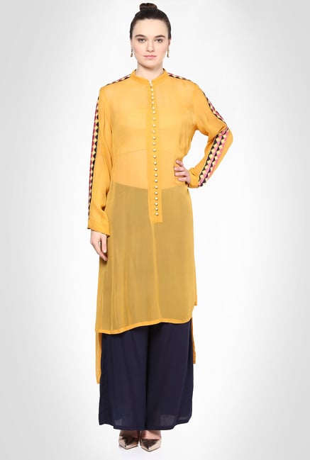 Saumya Pahwa Designer Wear Mustard Suit Set by Kimaya Saumya Pahwa Designer Wear Mustard Suit Set by Kimaya