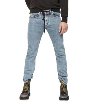 Diesel Rinse Washed Blue Buster L.32 Pantaloni Tapered Jeans Diesel Rinse Washed Blue Buster L.32 Pantaloni Tapered Jeans