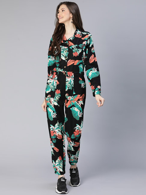 Red floral jumpsuit with fabric belt by Threeness | The Secret Label