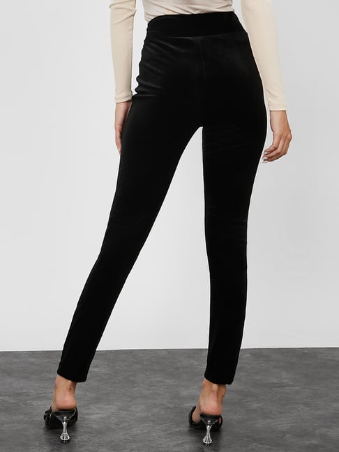 ASOS DESIGN leggings with sporty elastic waistband in black | ASOS