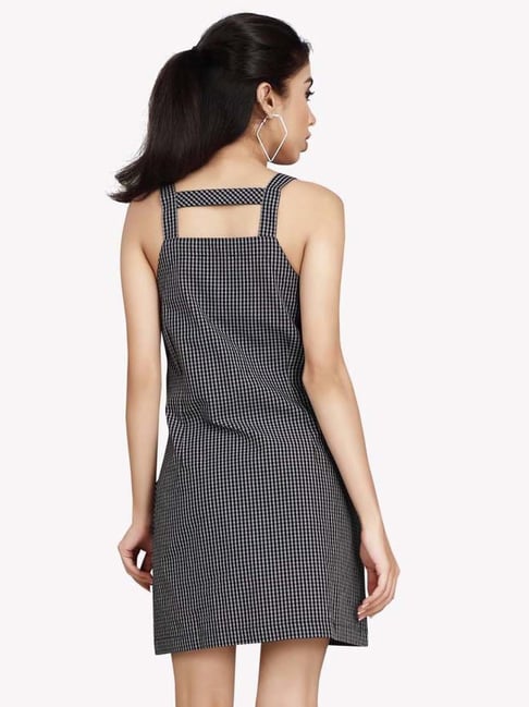 Chequered shop pinafore dress