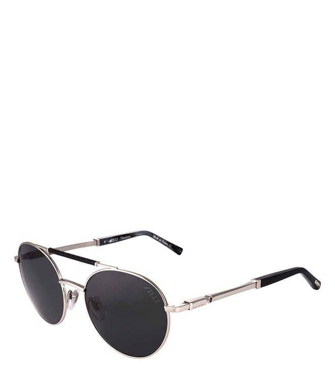 Gold and black Piotr sunglasses, green lenses