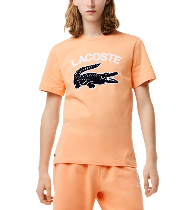 Orange lacoste sales t shirt