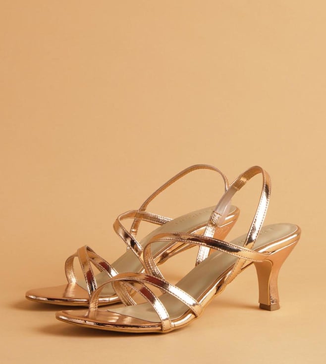 Gold strappy sales low heels