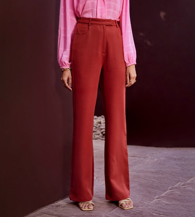 Stretch flared trousers with 70s inspired pink kaleidoscope print   Horizons Lointains