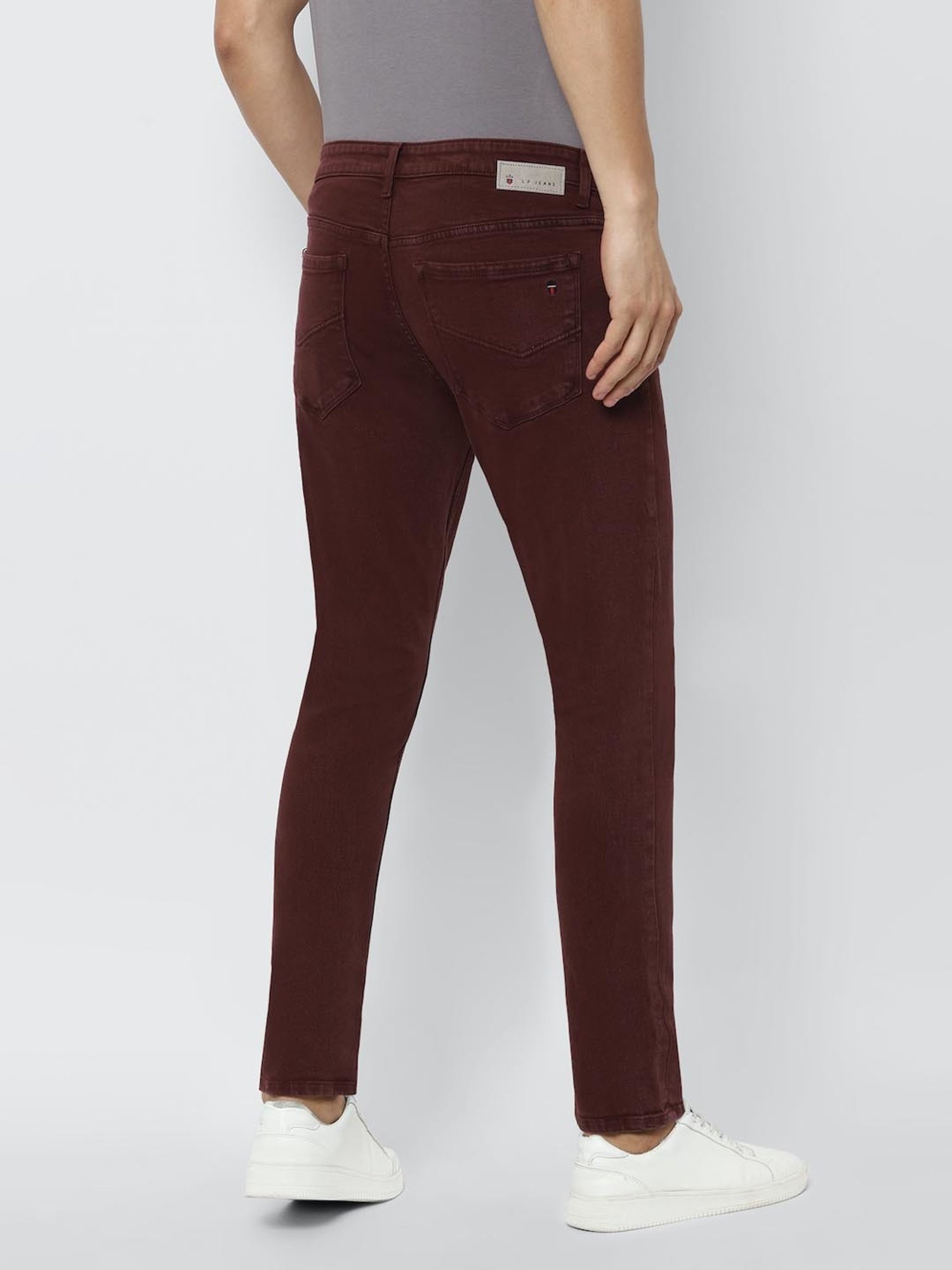 ASOS DESIGN skinny jeans in burgundy | ASOS
