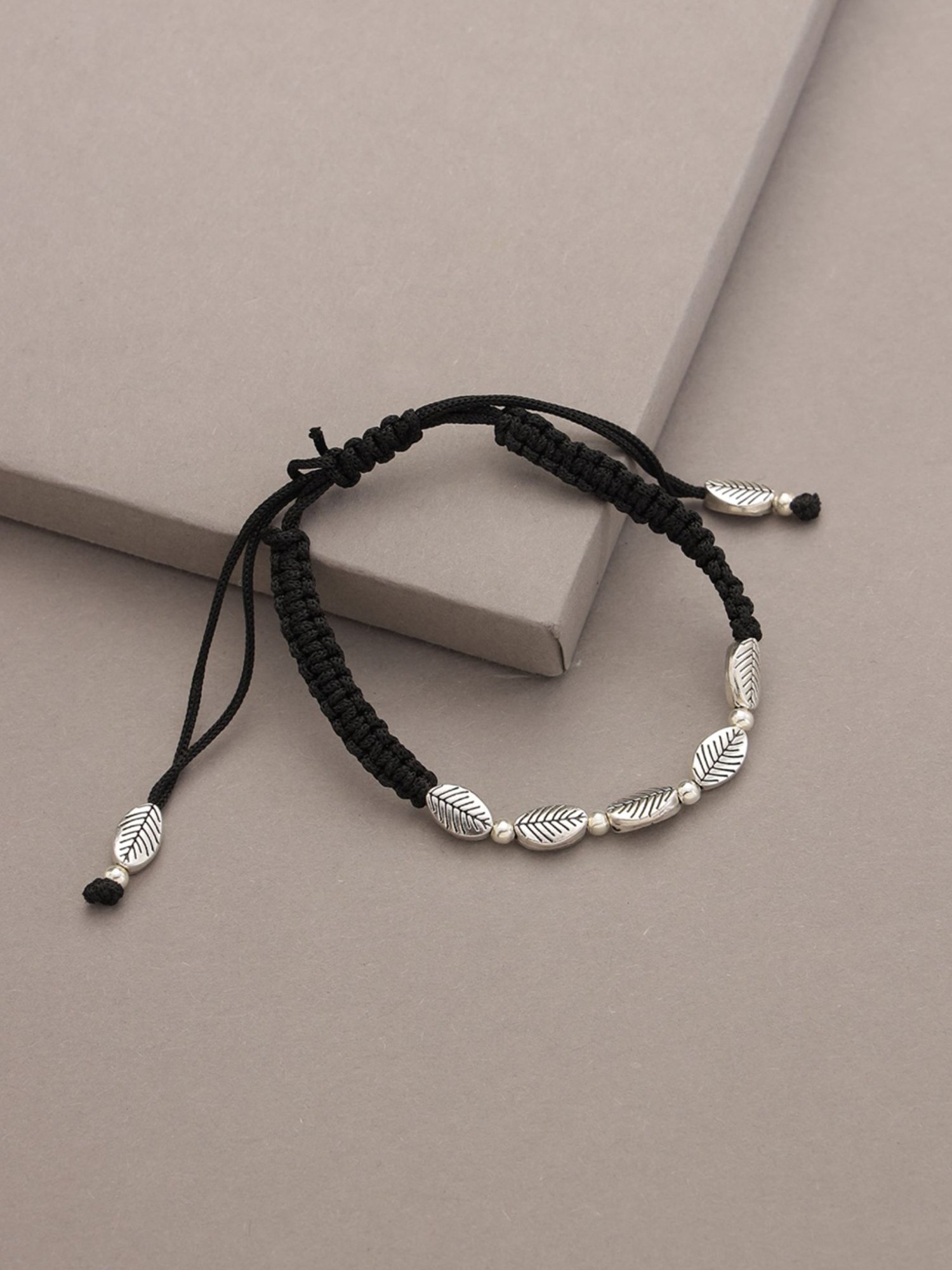 Buy Aatmana Black & Silver-toned Thread Bracelet Online At Best
