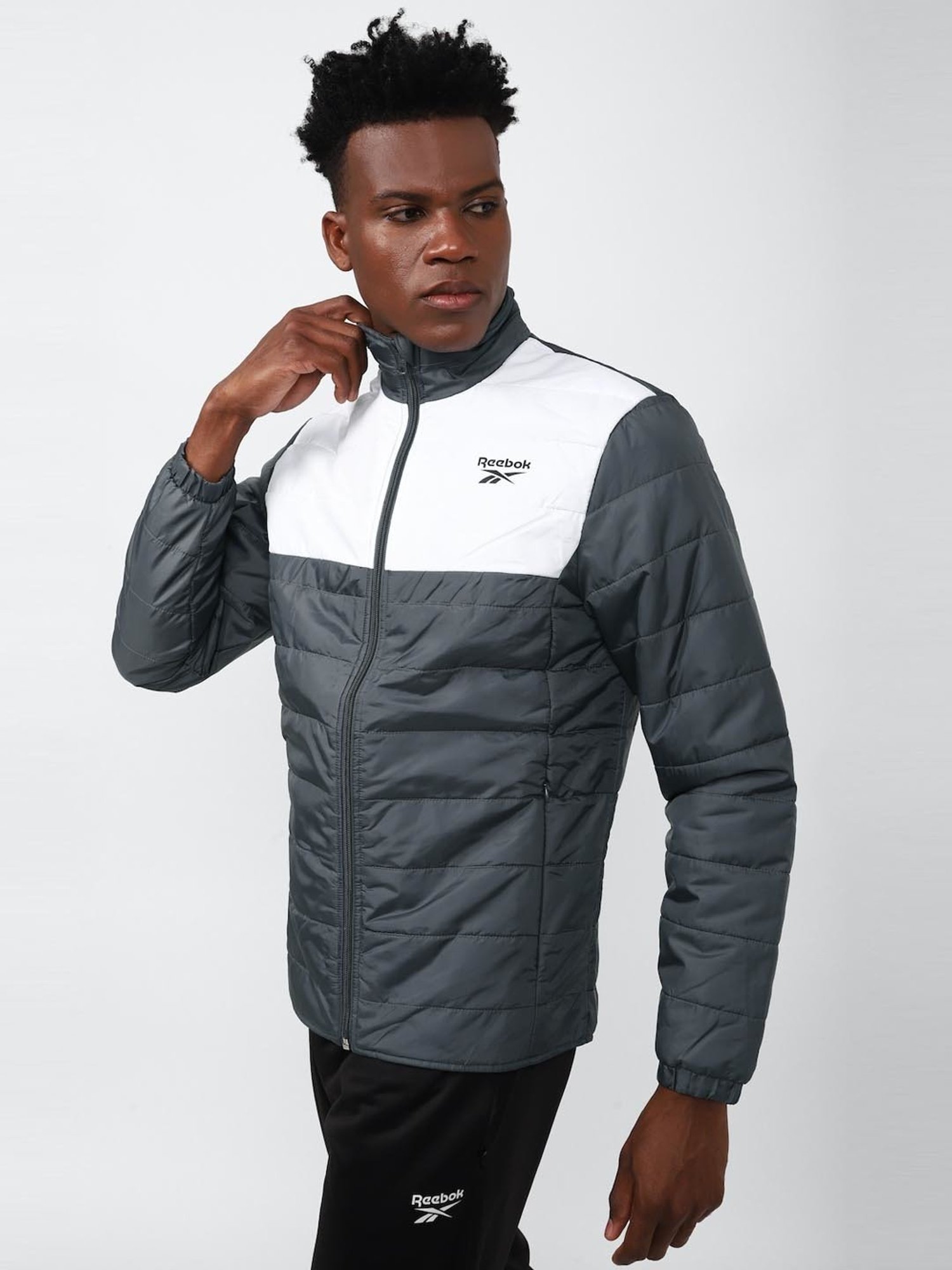 Buy Reebok Men Black Fitness Solid Quilted Jacket - Jackets for Men 2036462  | Myntra