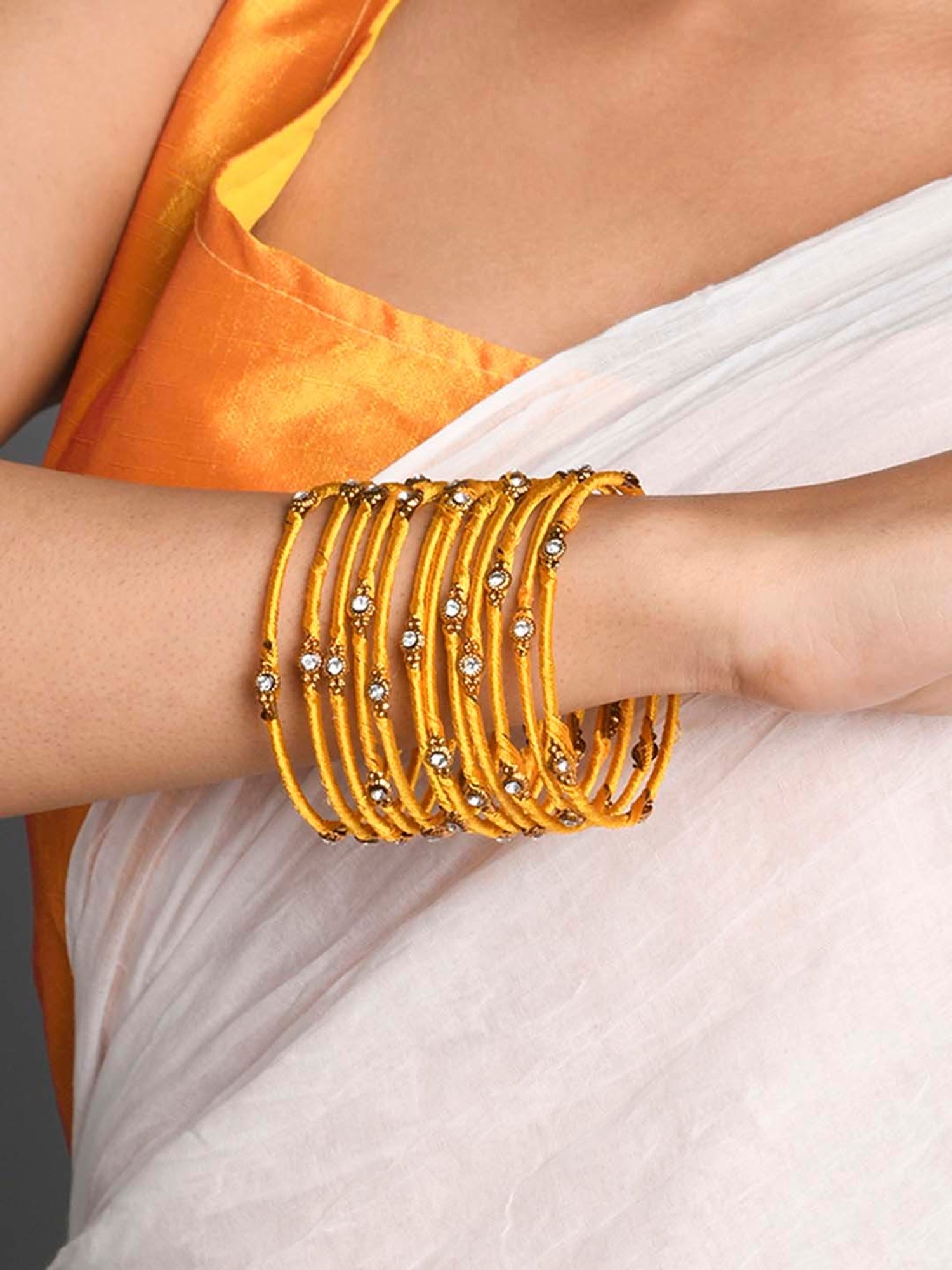 Yellow silk thread on sale bangles