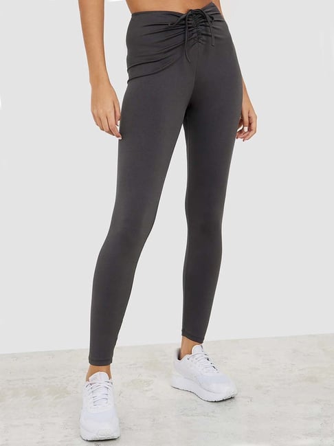 Sculpture High Waisted Tie Front Leggings in Sage | Oh Polly