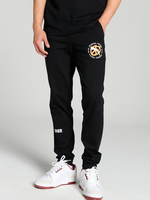 PUMA Logo Pants OH Solid Men Black Track Pants - Buy PUMA Logo Pants OH  Solid Men Black Track Pants Online at Best Prices in India