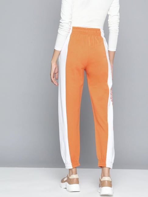 Orange and discount white track pants