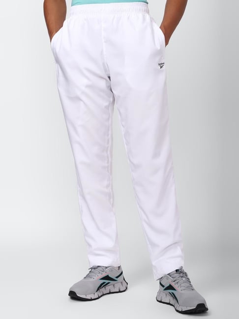 REEBOK Solid Men White Track Pants  Buy REEBOK Solid Men White Track Pants  Online at Best Prices in India  Flipkartcom