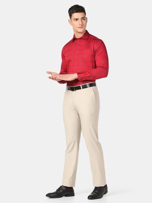 Premium Photo  Full length photo of amazing macho man good mood friendly  smiling look side empty space wear stylish red shirt with bow tie blue pants  shoes