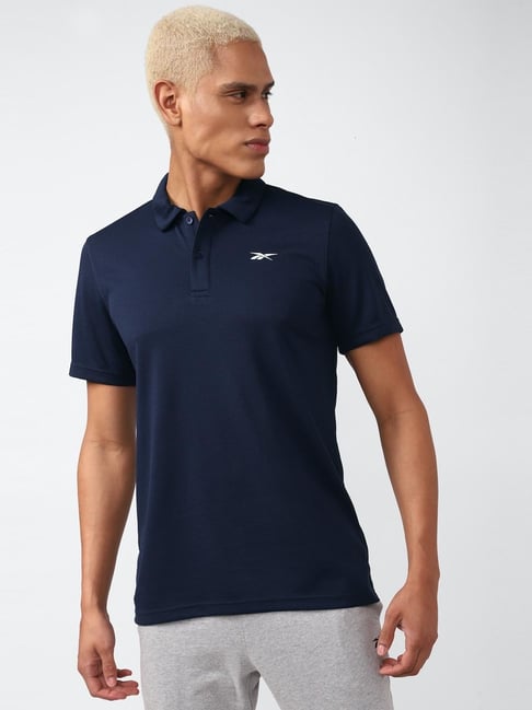 Navy blue reebok shirt on sale