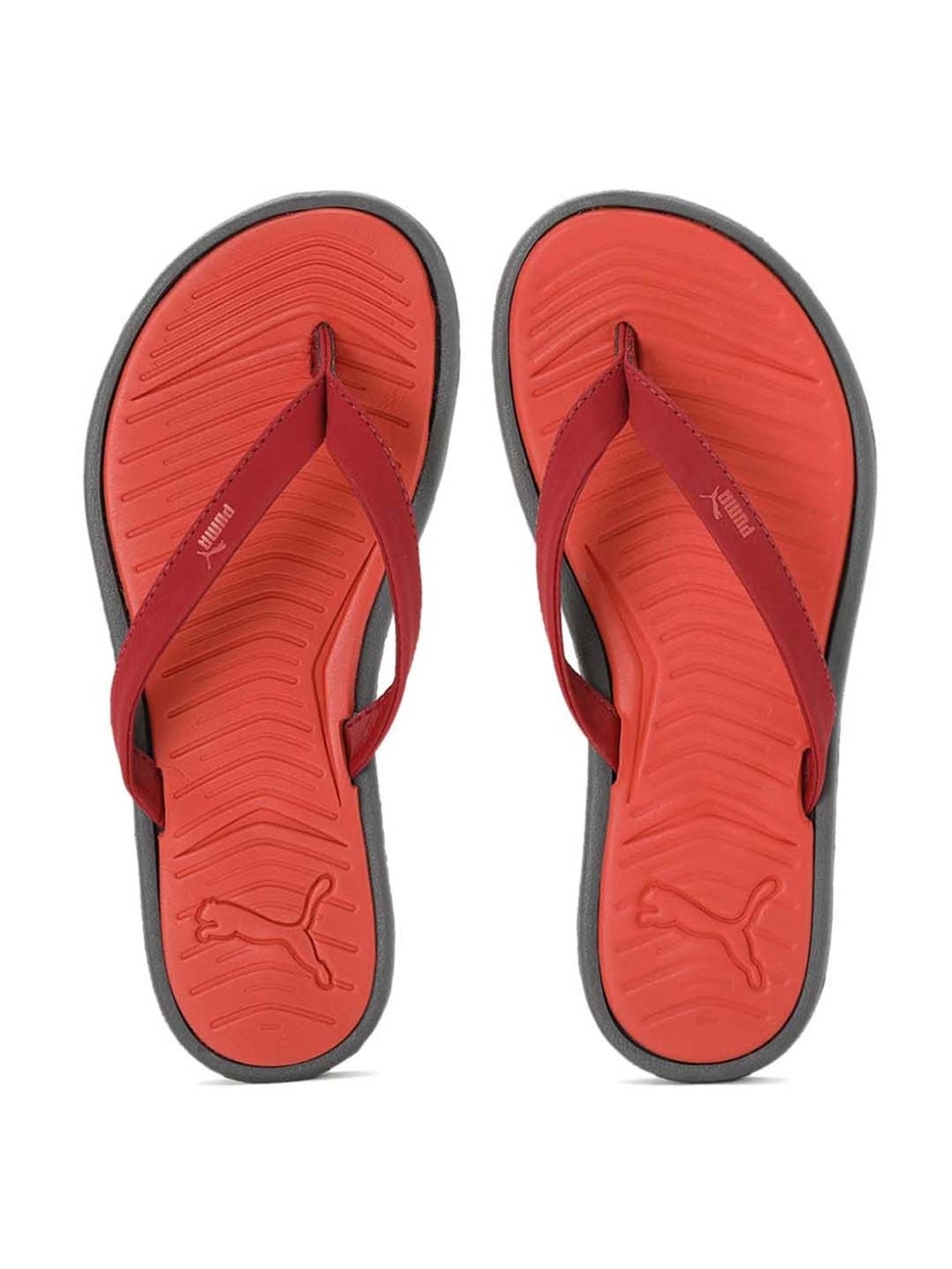 Puma red store flip flops