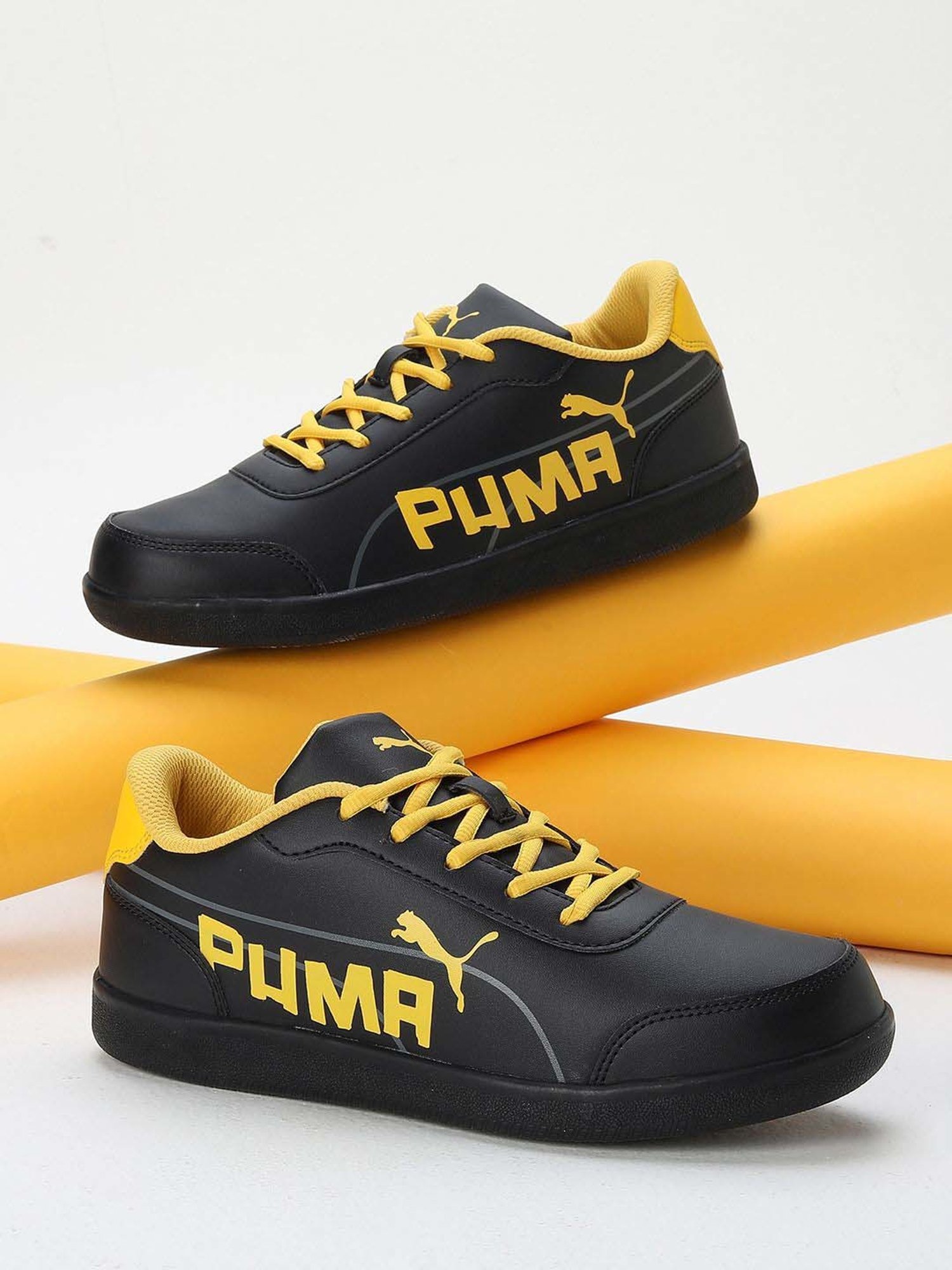 Black and clearance yellow puma shoes