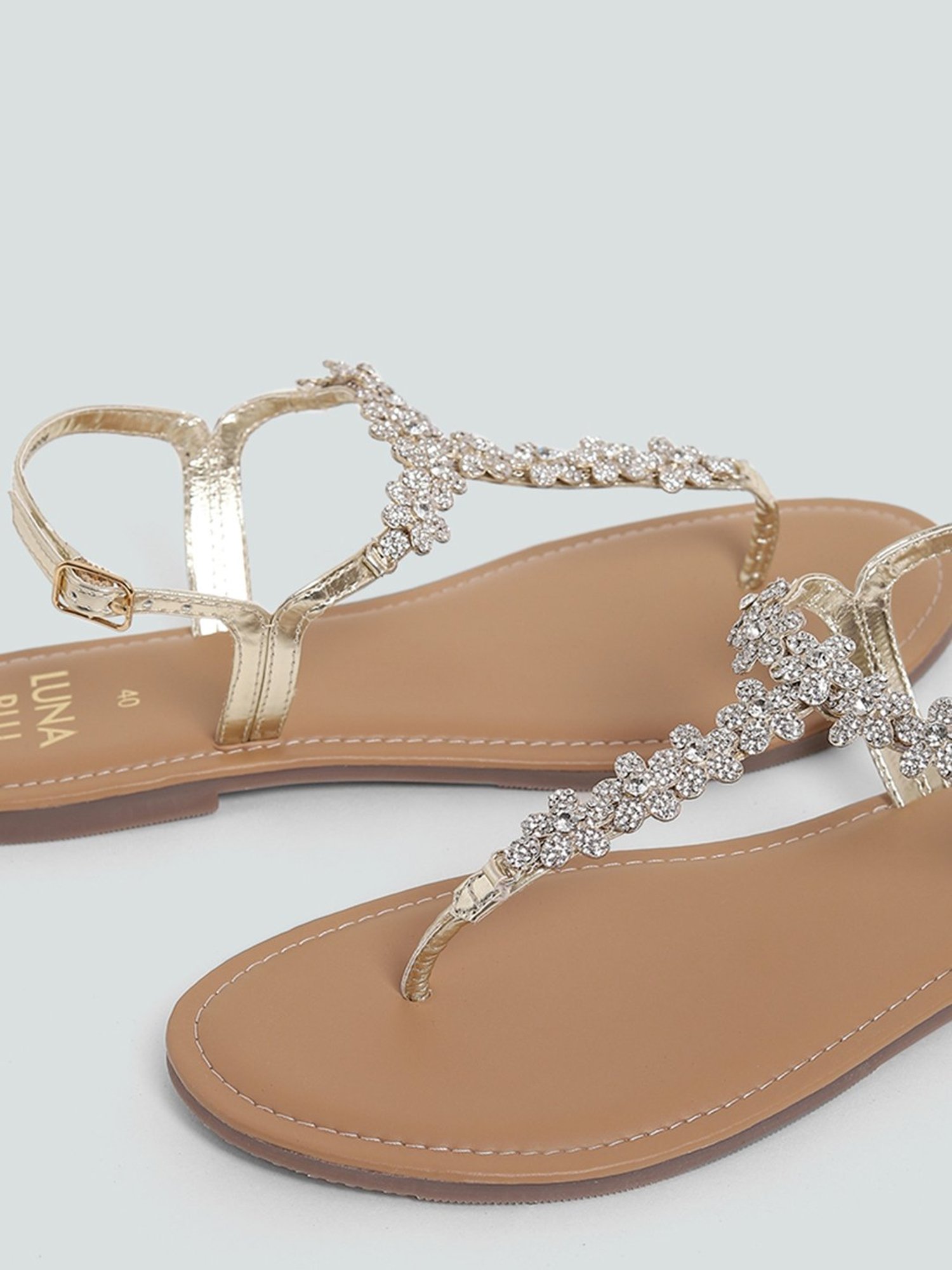 Accessorize Reno embellished rhinestone t-bar flat sandals in silver | ASOS