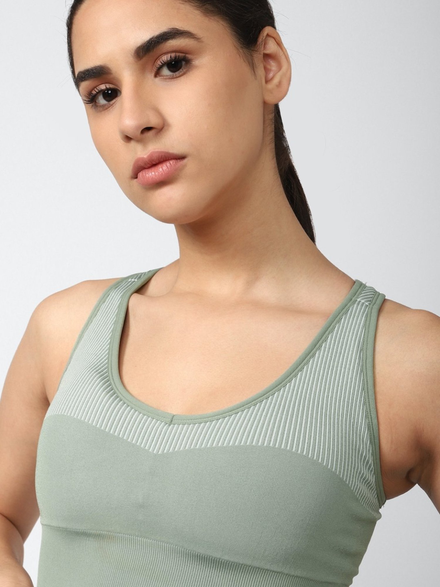 Buy Reebok Green Striped Sports Bra for Women Online @ Tata CLiQ