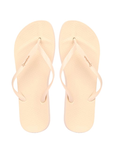 Cream discount flip flops