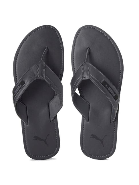 Puma flip flops black best sale