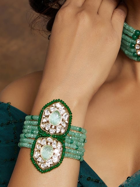 Buy SOHI Gold Plated Party Designer Stone Green Bracelet for Women Online