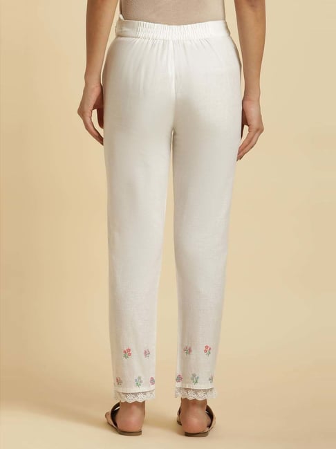 White Straight Pants With Lace Work On Flares | cotrasworld