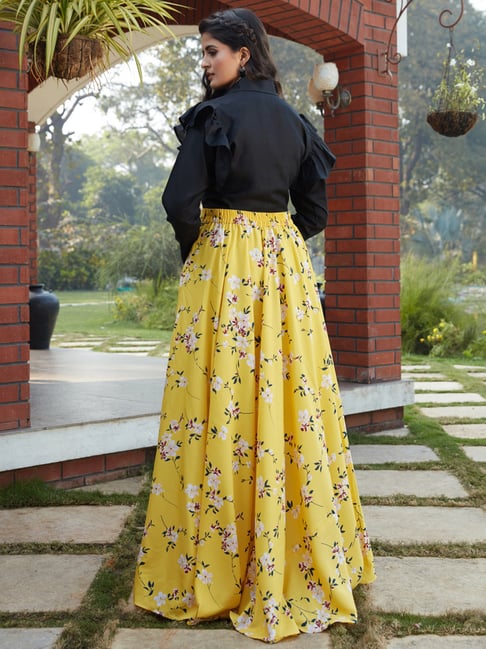 yellow top with black skirt
