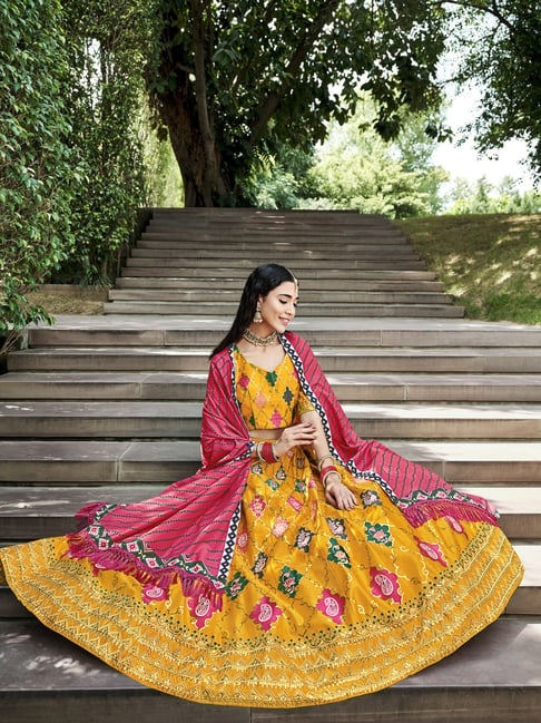 Handloom Silk and emboidered Lehenga in Yellow and pink  |lovelyweddingmall.com |
