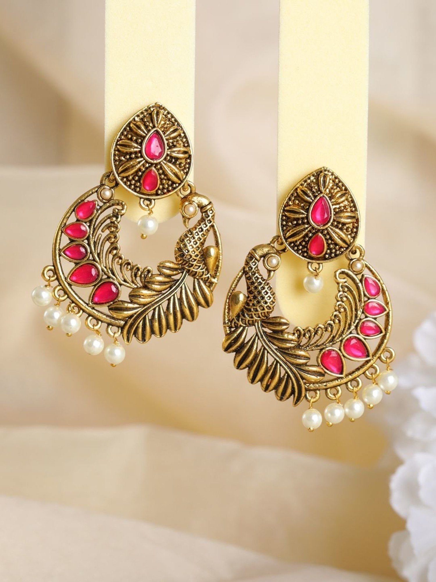 Aggregate more than 76 pink peacock earrings