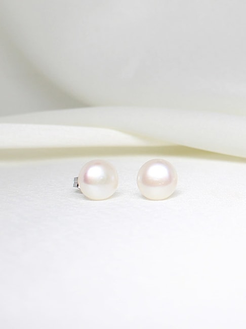 Single white pearl earrings - Essjai