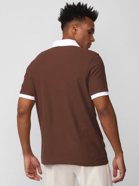 Reebok polo shirts brown sales