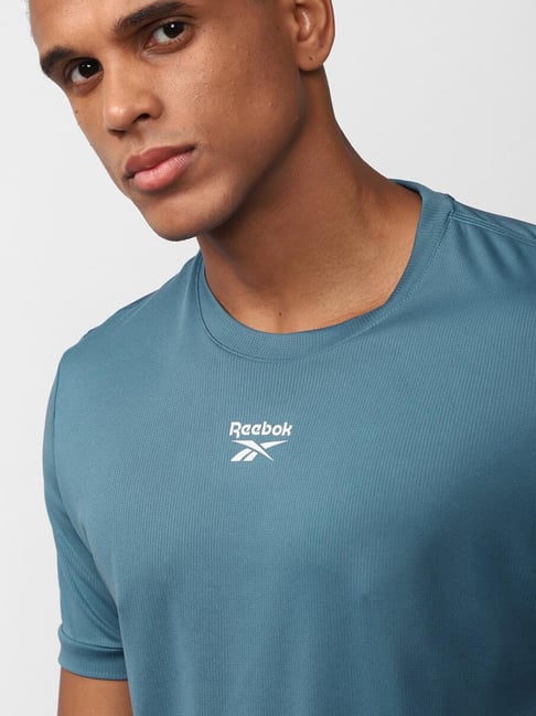 Buy Reebok Sky Blue Slim Fit Self Pattern T-Shirt for Mens Online @ Tata  CLiQ