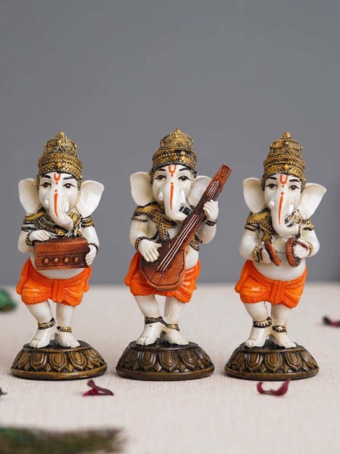 eCraftIndia White &amp; Orange Resin Standing Lord Ganesha Idols Playing Harmonium Showpiece - Set of 3