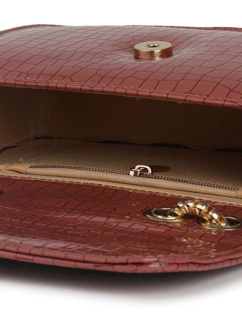 Buy Gaurapakhi Peach Textured Small Sling Handbag Online At Best