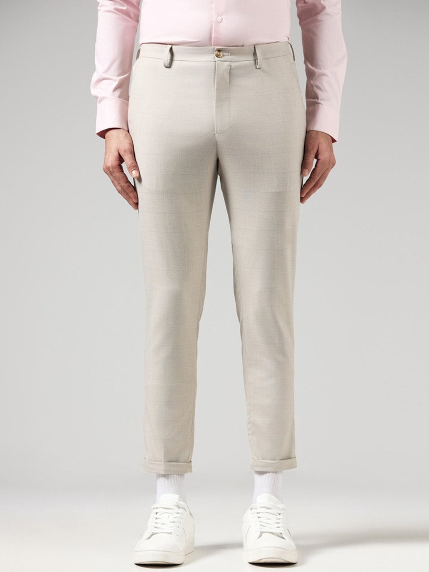 WES Formals by Westside Solid Beige Carrot Fit Trousers