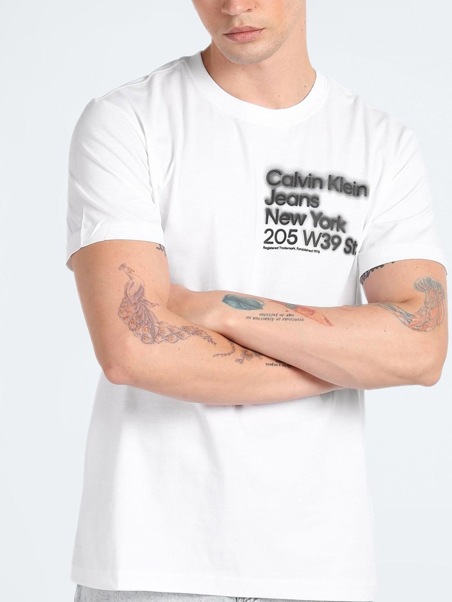Buy Calvin Klein Jeans White Cotton Regular Fit Logo Printed T-Shirt for  Mens Online @ Tata CLiQ