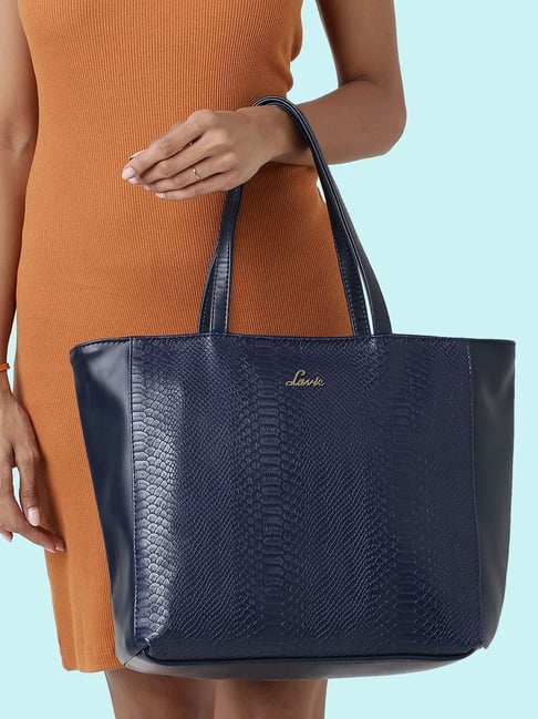 Buy online Navy Blue Textured Regular Handbag from bags for Women