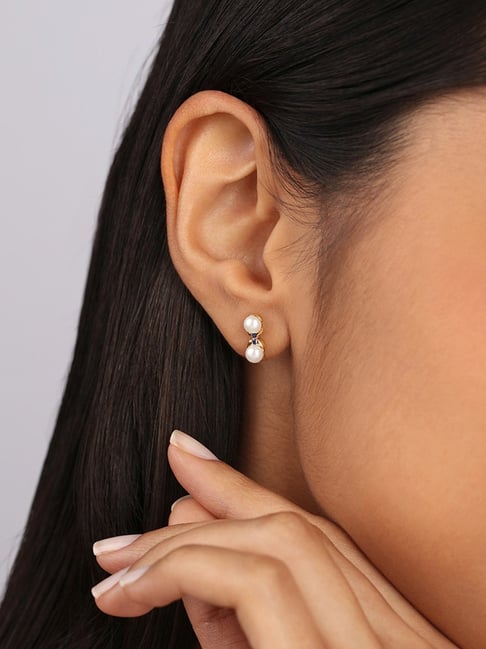 Buy TANISHQ 22KT Gold and Polky Diamond Stud Earrings Online - Best Price  TANISHQ 22KT Gold and Polky Diamond Stud Earrings - Justdial Shop Online.