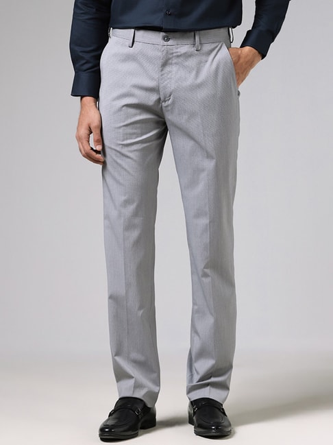 WES Formals by Westside Solid Navy Blue Carrot Fit Trousers