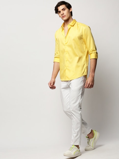 Casual Man in Baggy Pants and Yellow Shirt Over White Stock Photo - Image  of thirties, profile: 117340