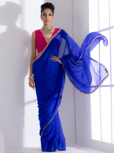 Buy Adivikat plain blue silk georgette saree with Golden blouse at Amazon.in