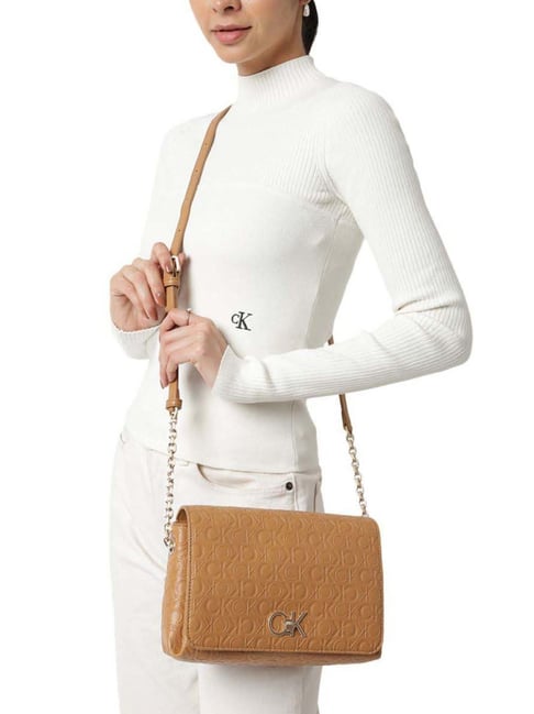 Buy Calvin Klein Brown Re-Lock Medium Cross Body Bag for Women