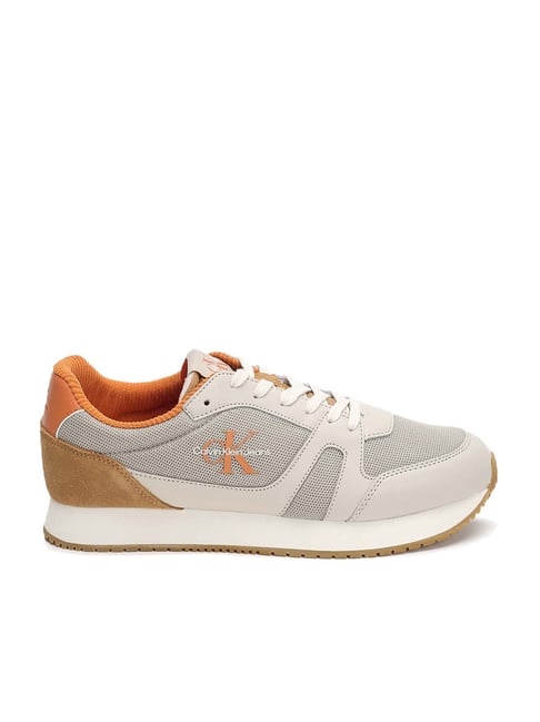 Orange calvin store klein sneakers