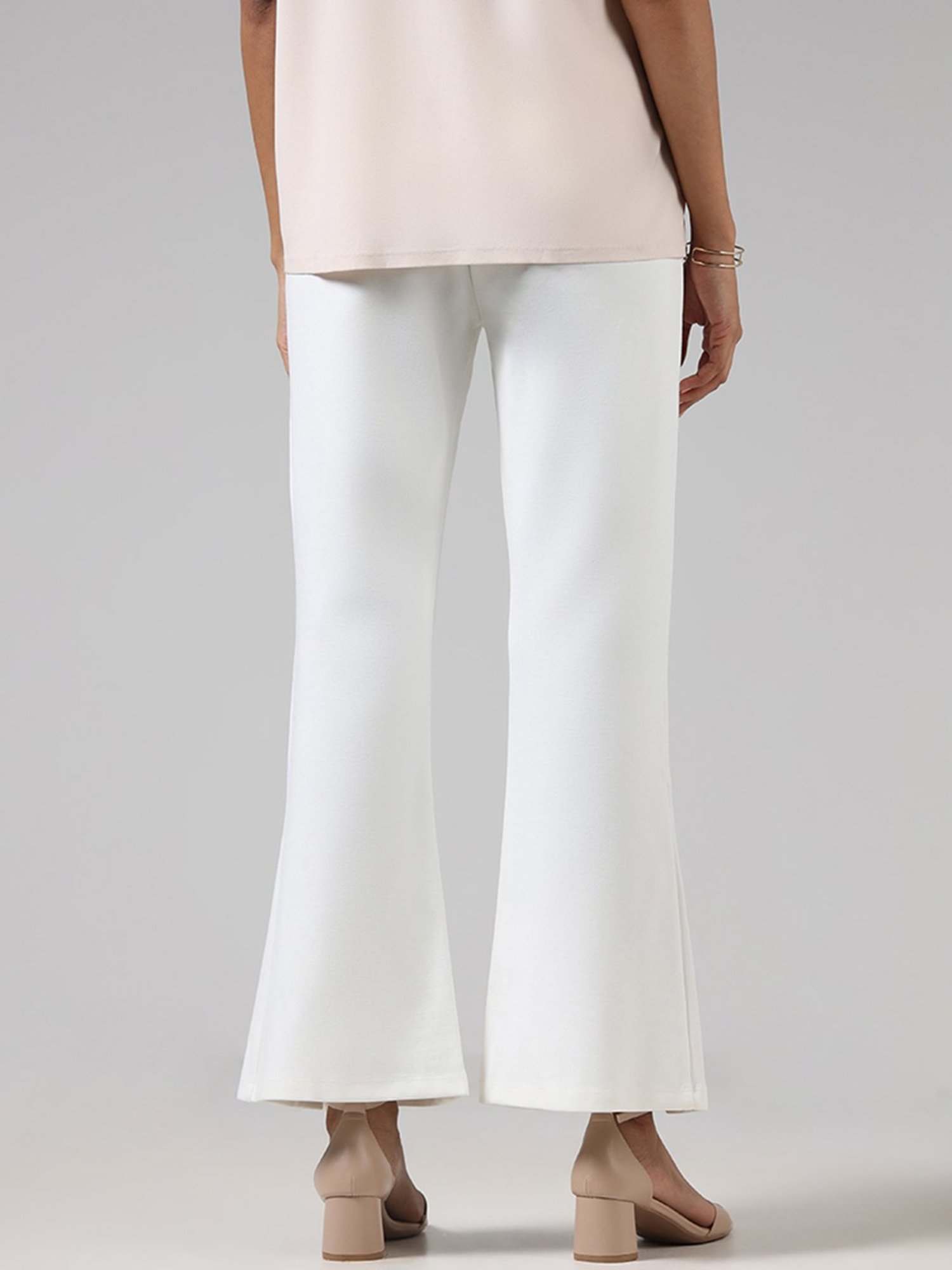 Buy Wardrobe by Westside Solid Off White Slit Ponte Trousers for