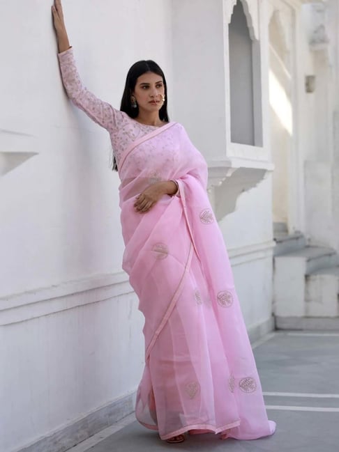 Roseleen by Nawshin Ahmed - Saree Details: white net saree with baby pink  embroidery work on top half of the saree. Blouse and peticote: Baby pink  butterfly silk material. Price of saree: