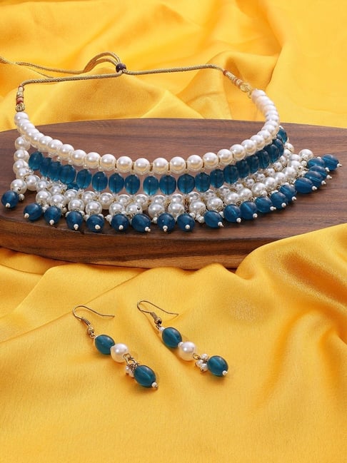 Buy Shell Pearls And Zircons Embellished & Thread Earrings by ITRANA Online  at Aza Fashions.