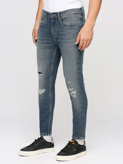 Lee Cooper Jeans buckle back kepala kain, Men's Fashion, Bottoms, Jeans on  Carousell